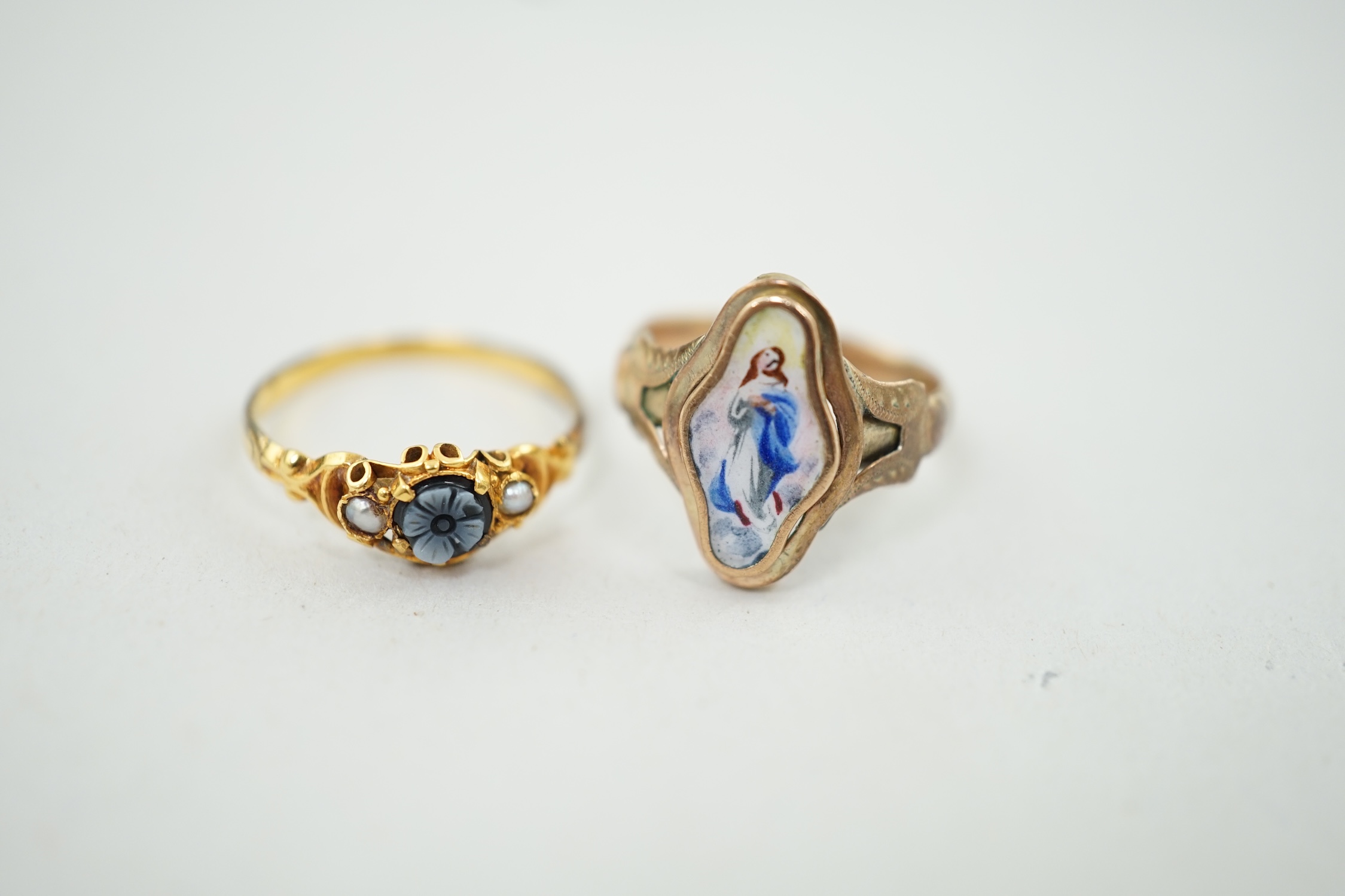 A Victorian gold, sardonyx and seed pearl set 'flower' ring, size N, together with a gold and enamel ring, decorated with a figure of a lady